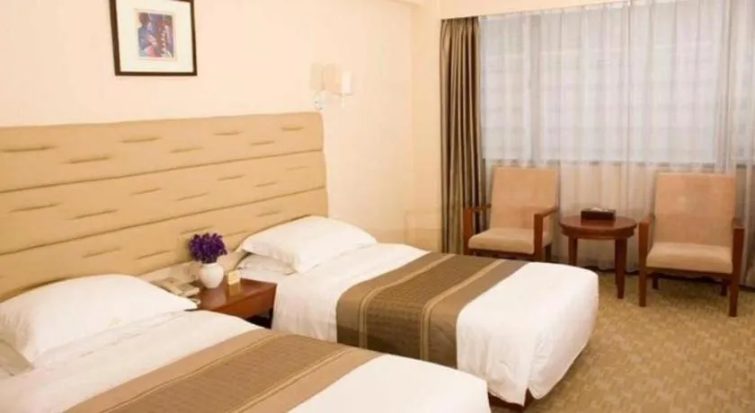 Bed in Guilin Plaza Hotel