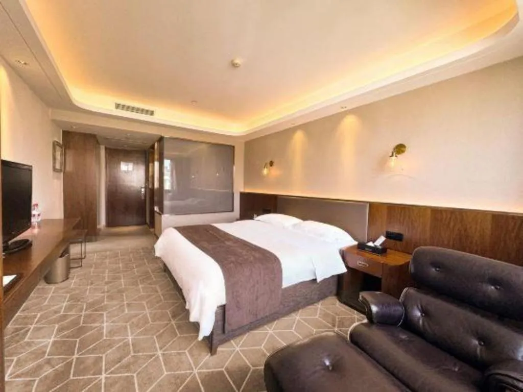 Bed in Guilin Plaza Hotel