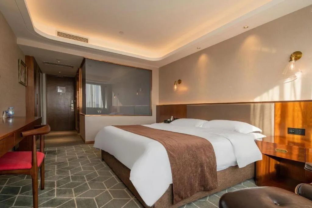 Bed in Guilin Plaza Hotel