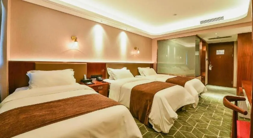 Bed in Guilin Plaza Hotel