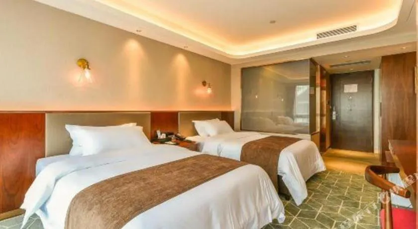 Bed in Guilin Plaza Hotel