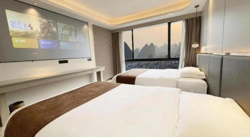 Bed in Guilin Plaza Hotel