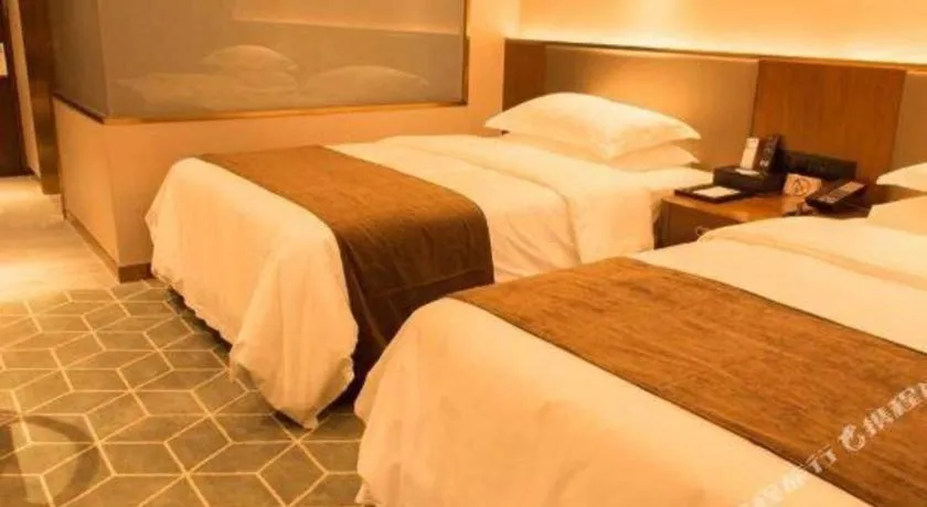 Bed in Guilin Plaza Hotel