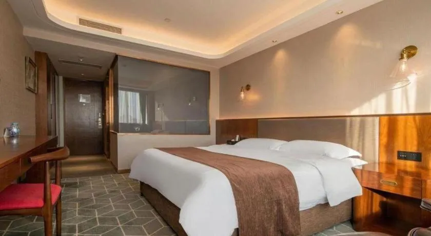 Bed in Guilin Plaza Hotel