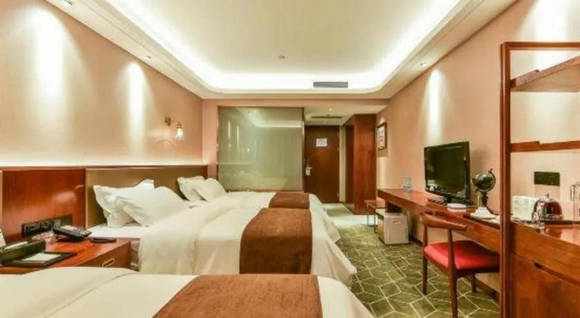 Bed in Guilin Plaza Hotel