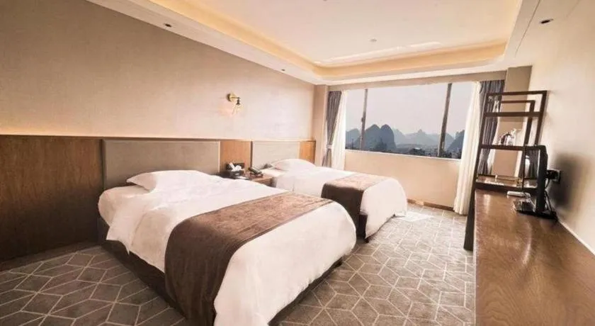 Bed in Guilin Plaza Hotel