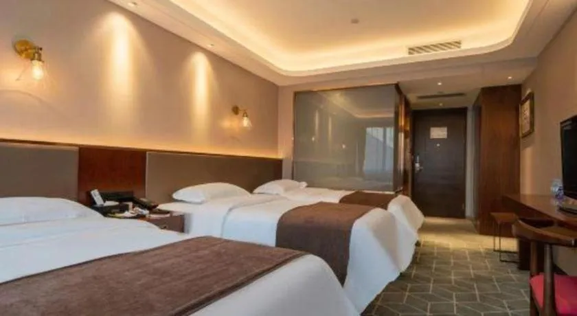 Bed in Guilin Plaza Hotel