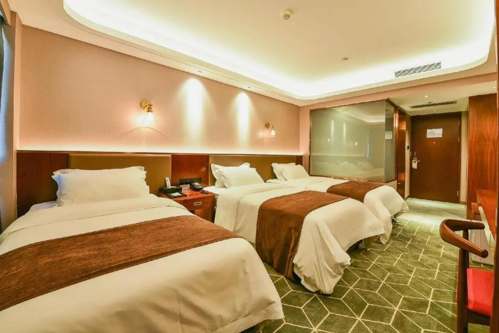 Bed in Guilin Plaza Hotel