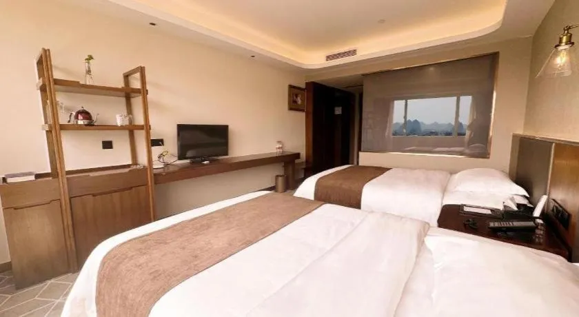 Bed in Guilin Plaza Hotel