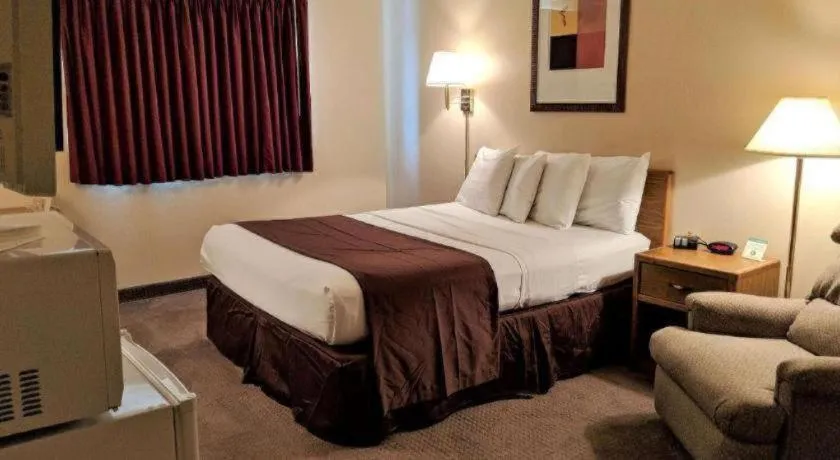 Bed in Americas Best Value Inn Torrington