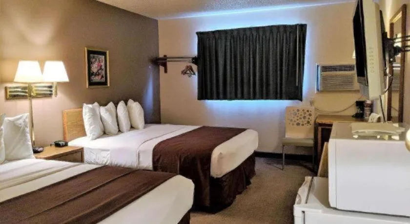 Bed in Americas Best Value Inn Torrington