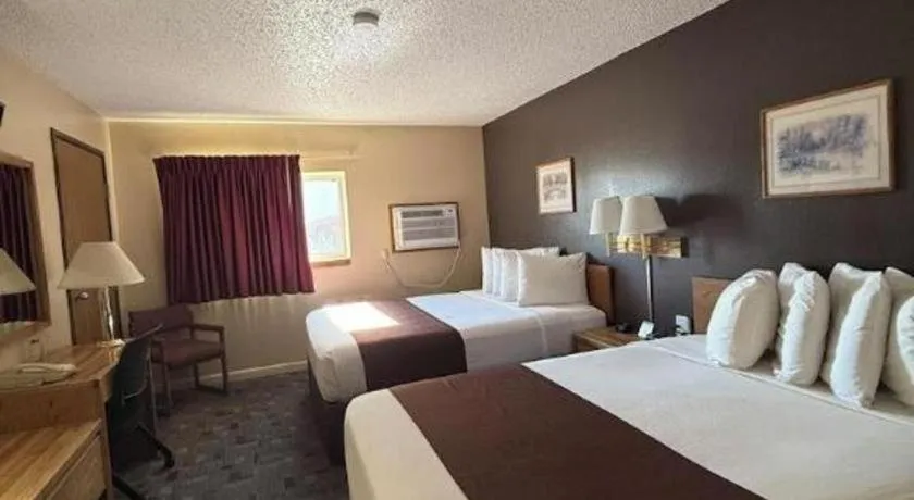 Bed in Americas Best Value Inn Torrington