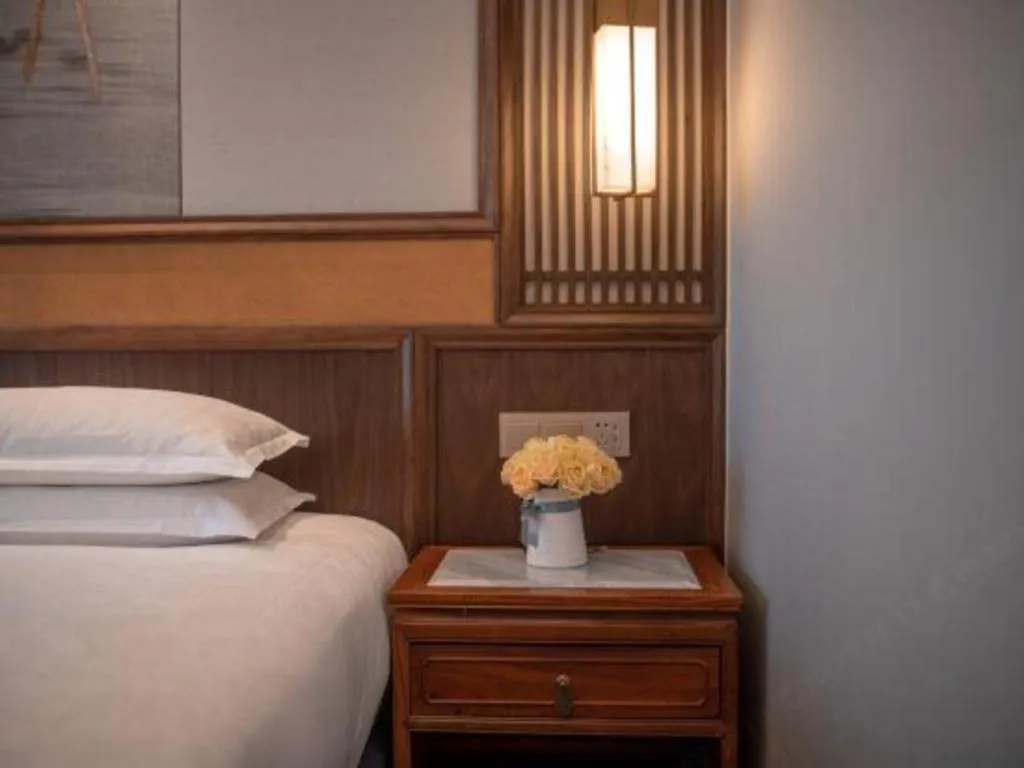 Bed in Hangzhou Blossom Hotel