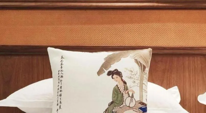 Bed in Hangzhou Blossom Hotel