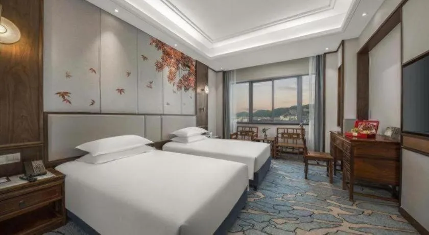 Bed in Hangzhou Blossom Hotel