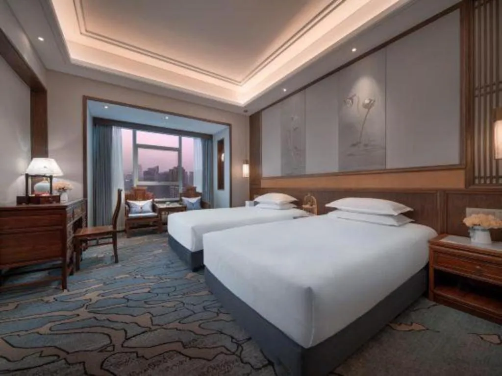 Bed in Hangzhou Blossom Hotel