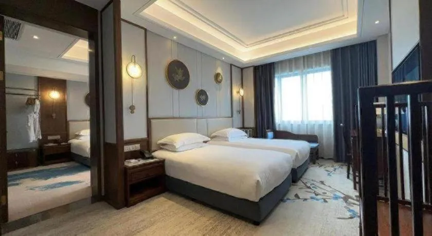 Bed in Hangzhou Blossom Hotel