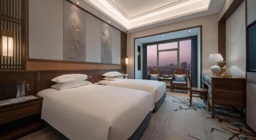 Bed in Hangzhou Blossom Hotel