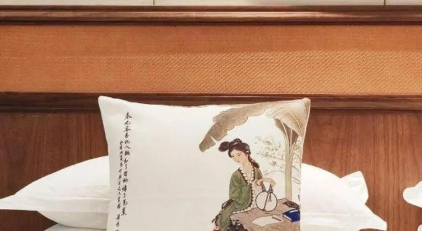 Bed in Hangzhou Blossom Hotel