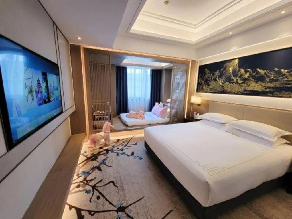 Bed in Hangzhou Blossom Hotel