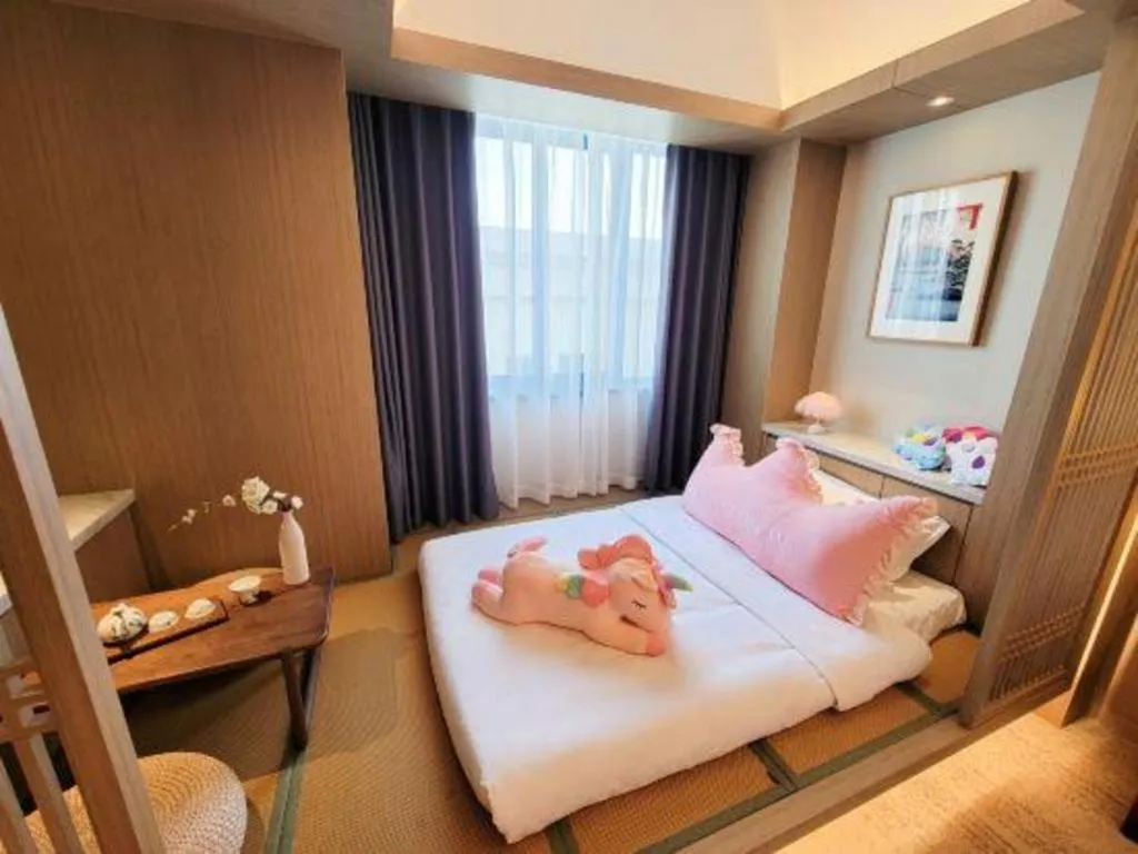 Bed in Hangzhou Blossom Hotel