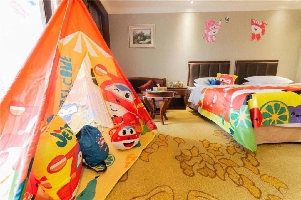 Bed in Xinjin Celebrity City Hotel