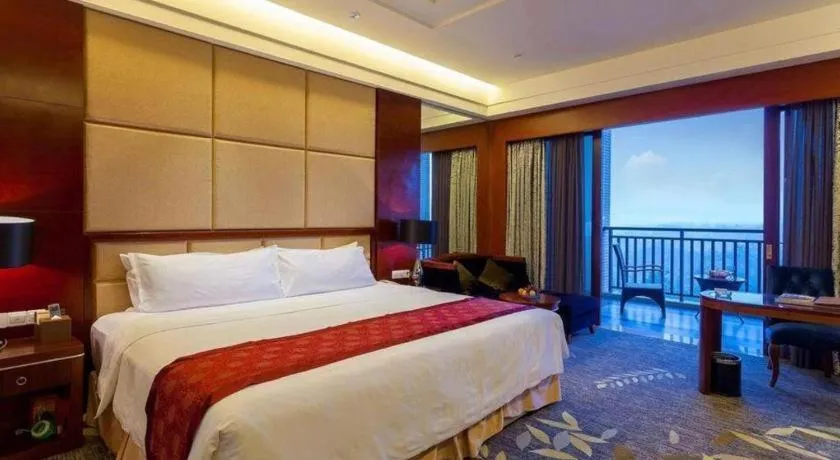 Bed in Xinjin Celebrity City Hotel