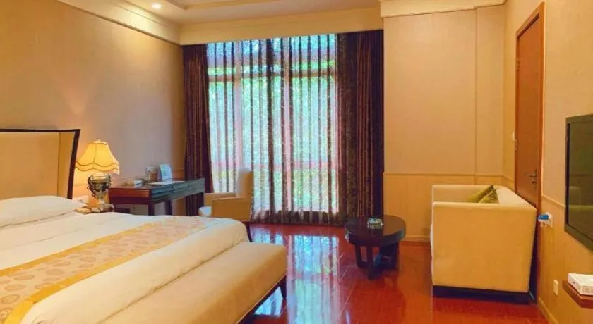 Bed in Xinjin Celebrity City Hotel