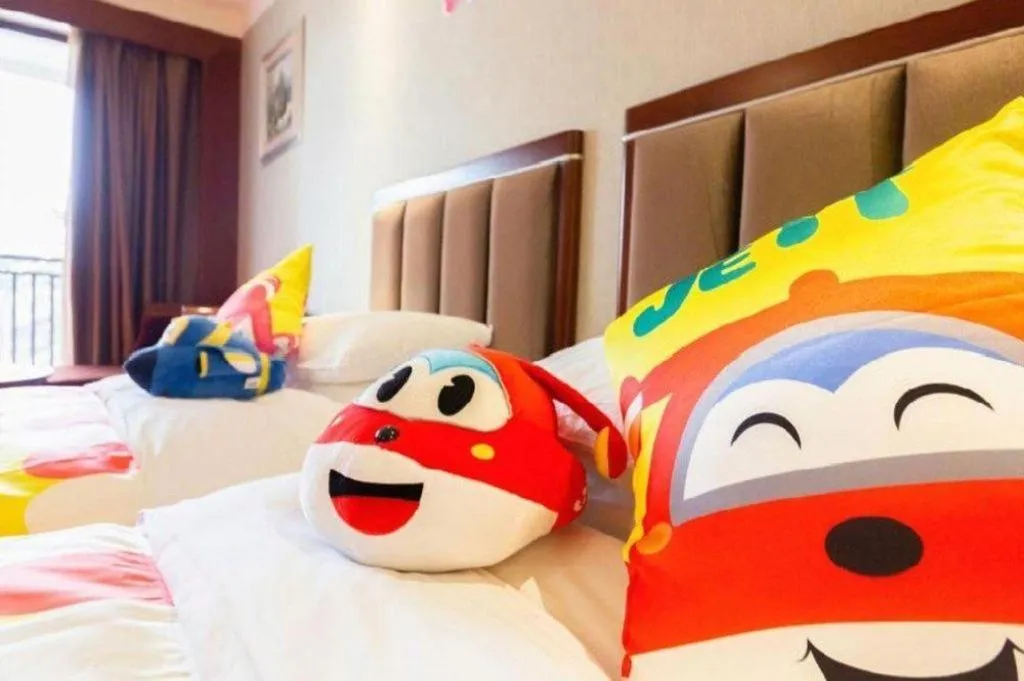 Bed in Xinjin Celebrity City Hotel