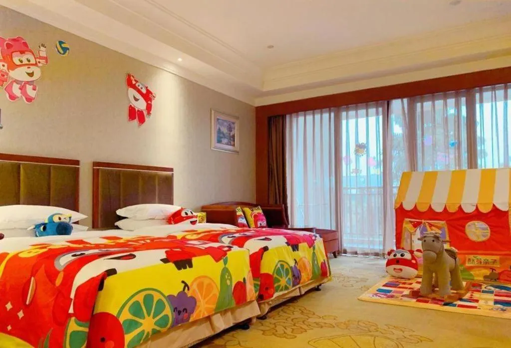 Bed in Xinjin Celebrity City Hotel