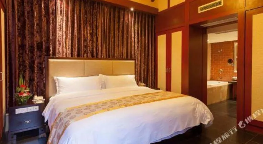 Bed in Xinjin Celebrity City Hotel