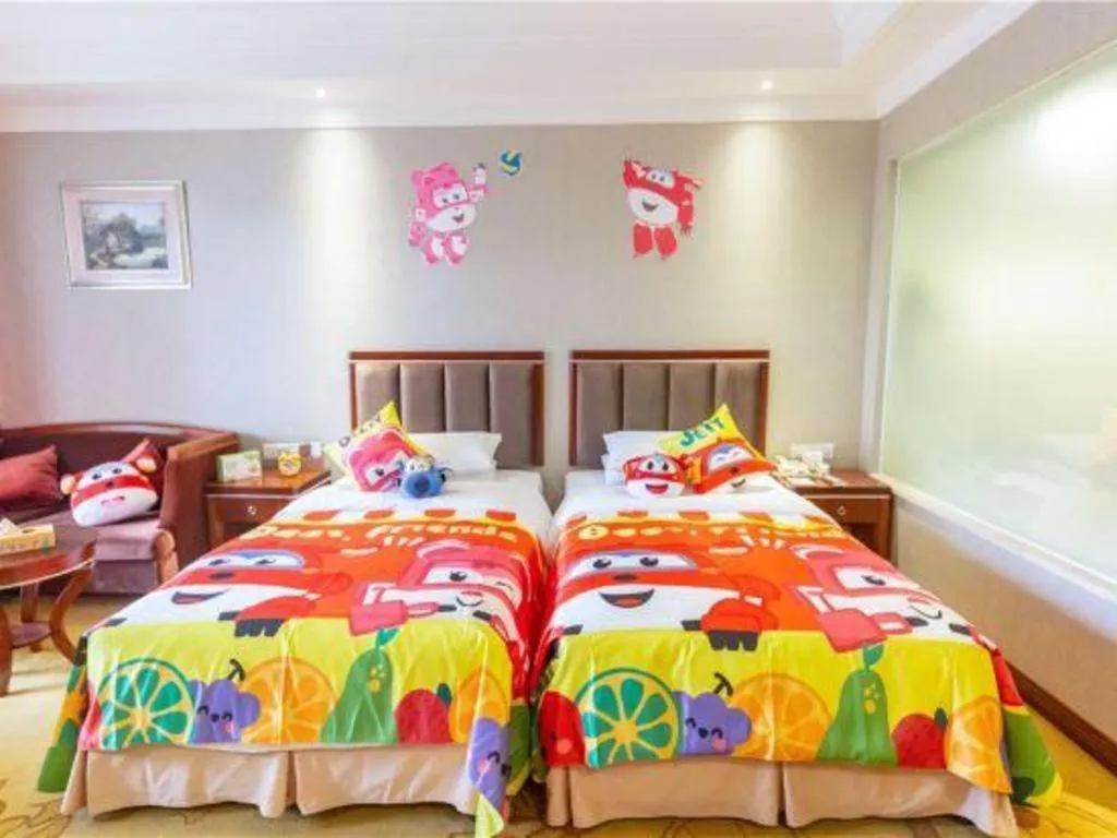 Bed in Xinjin Celebrity City Hotel