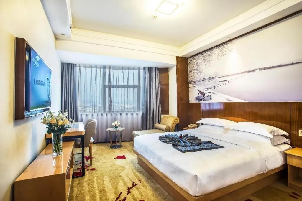 Bed in Huachen Kenzo Hotel Hangzhou