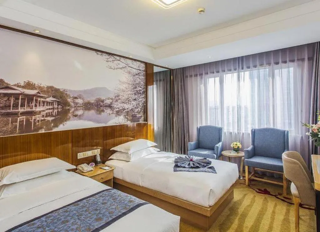 Bed in Huachen Kenzo Hotel Hangzhou