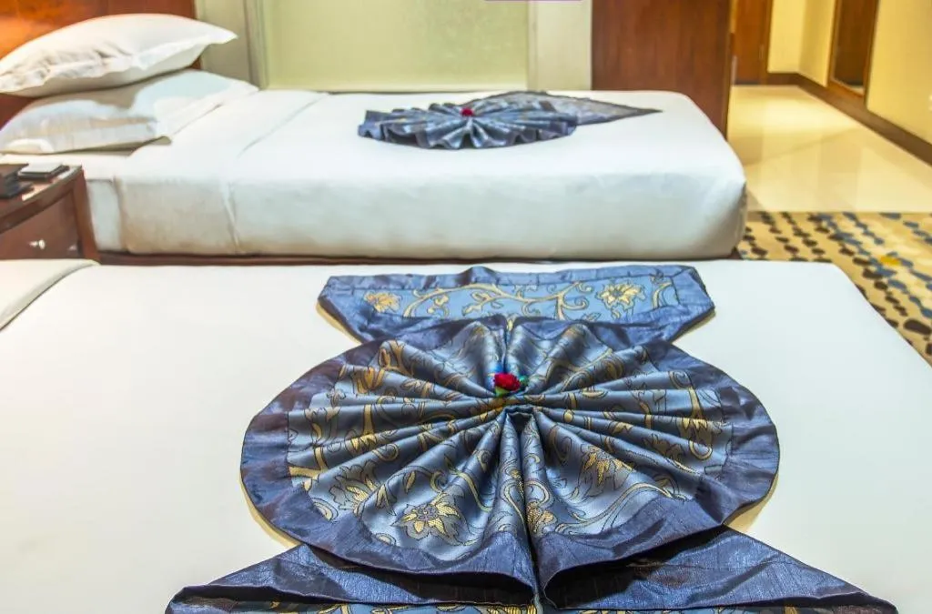 Bed in Huachen Kenzo Hotel Hangzhou