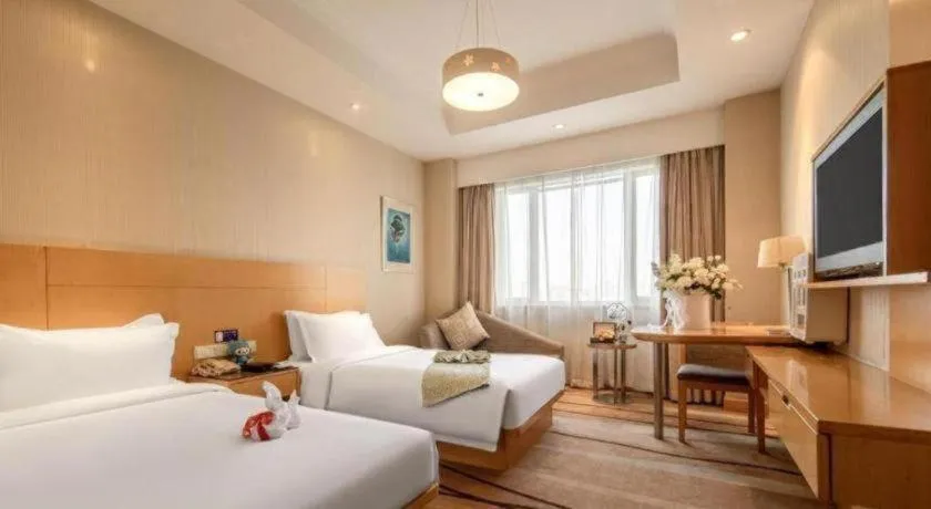 Bed in Huachen Kenzo Hotel Hangzhou