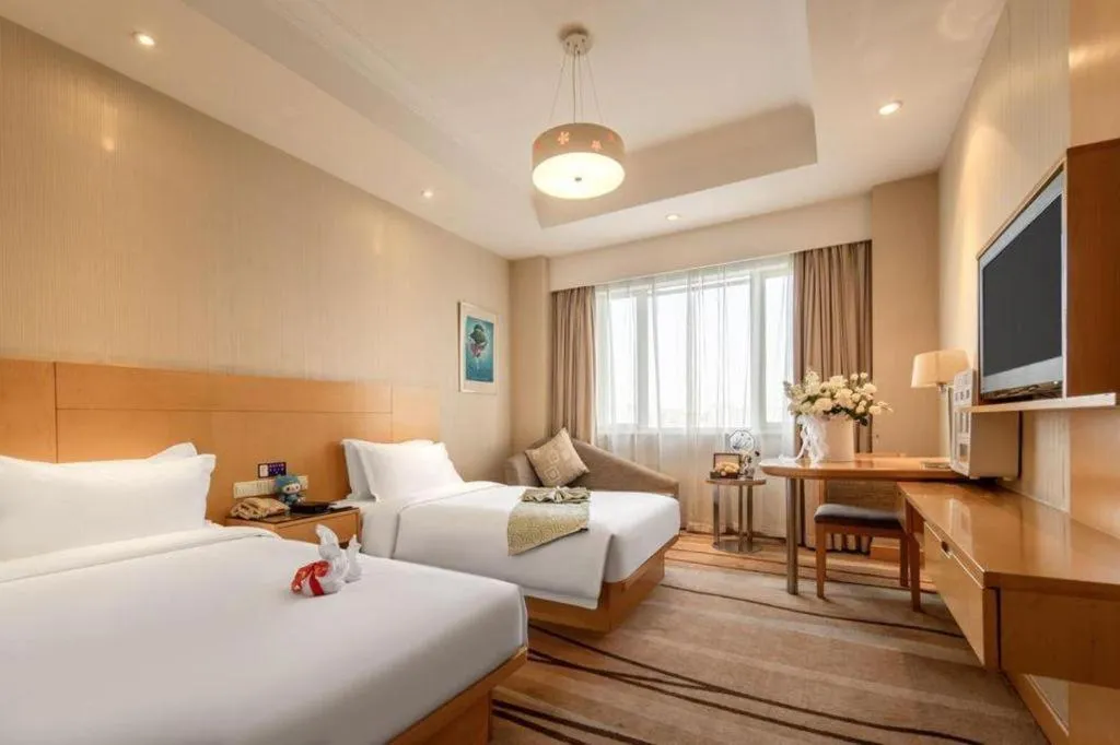 Bed in Huachen Kenzo Hotel Hangzhou