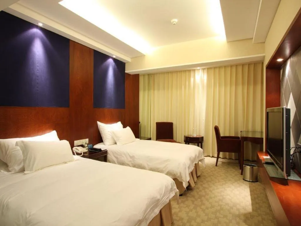 Bed in Huachen Kenzo Hotel Hangzhou