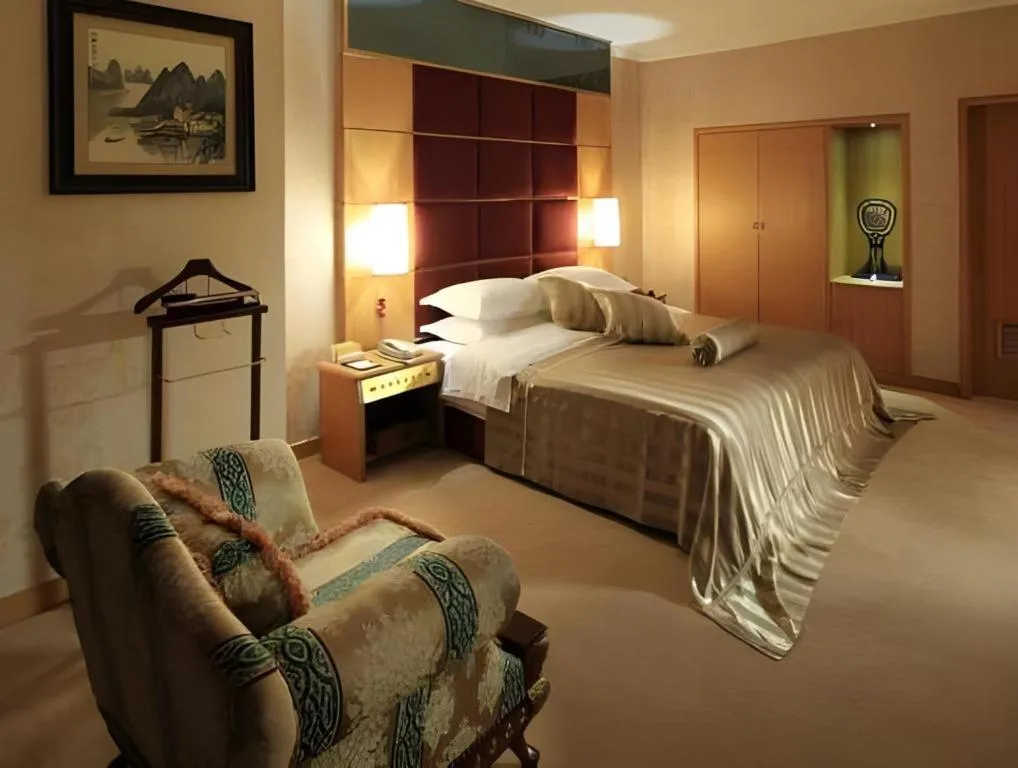 Bed in Economic Trade Hotel