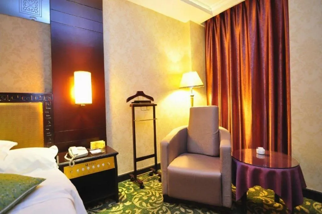 Bed in Economic Trade Hotel