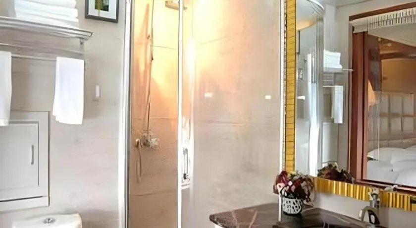 Bed in Economic Trade Hotel