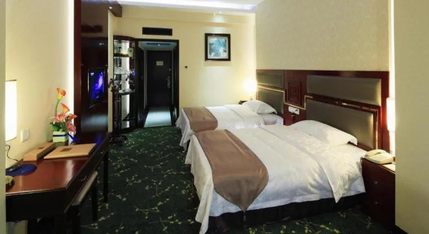 Bed in Economic Trade Hotel