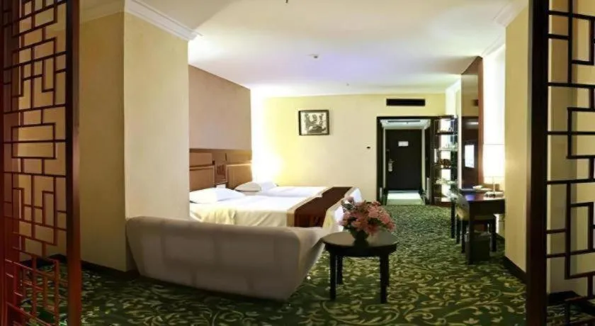 Bed in Economic Trade Hotel