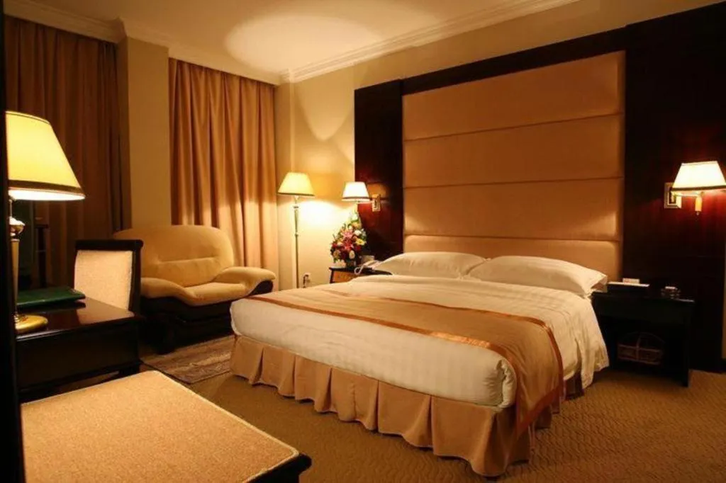 Bed in Economic Trade Hotel