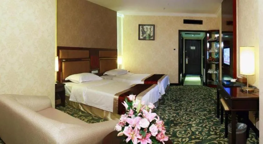 Bed in Economic Trade Hotel