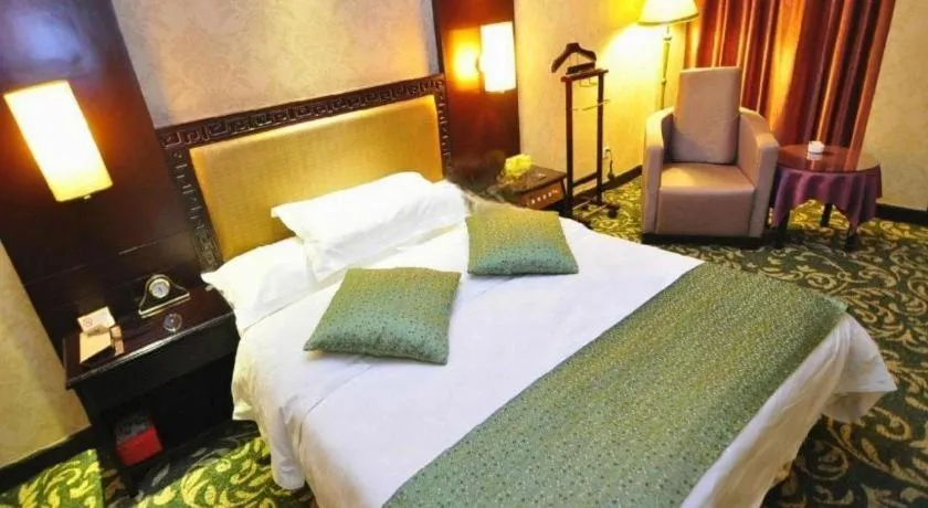 Bed in Economic Trade Hotel
