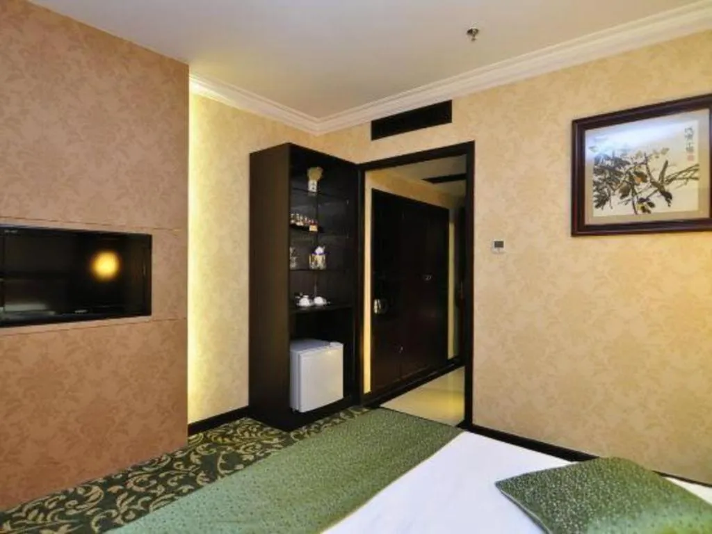 Bed in Economic Trade Hotel