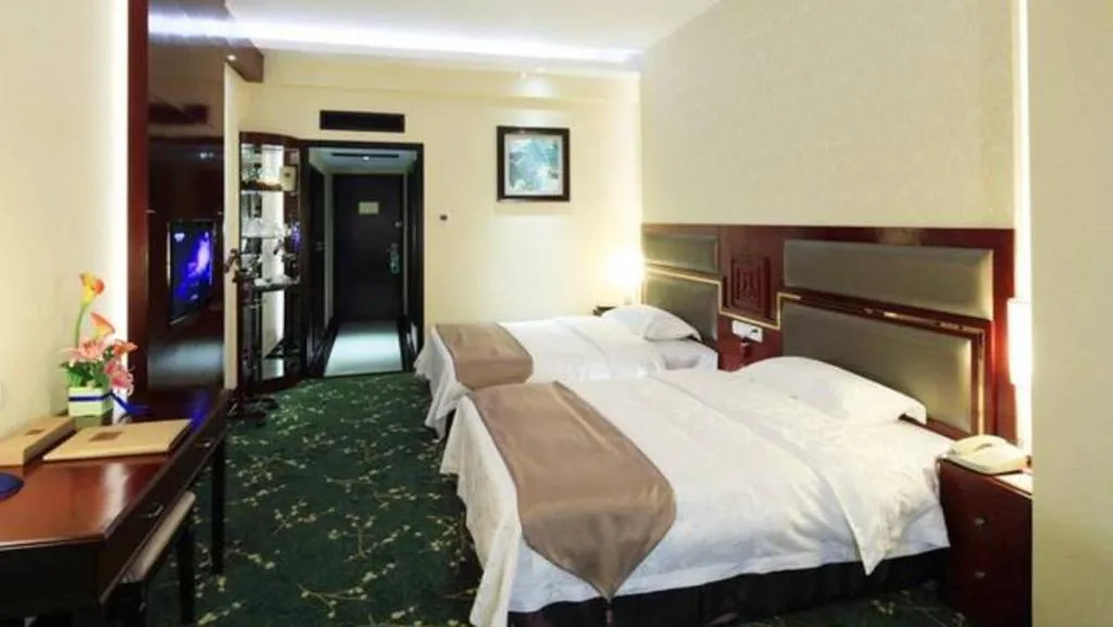Bed in Economic Trade Hotel