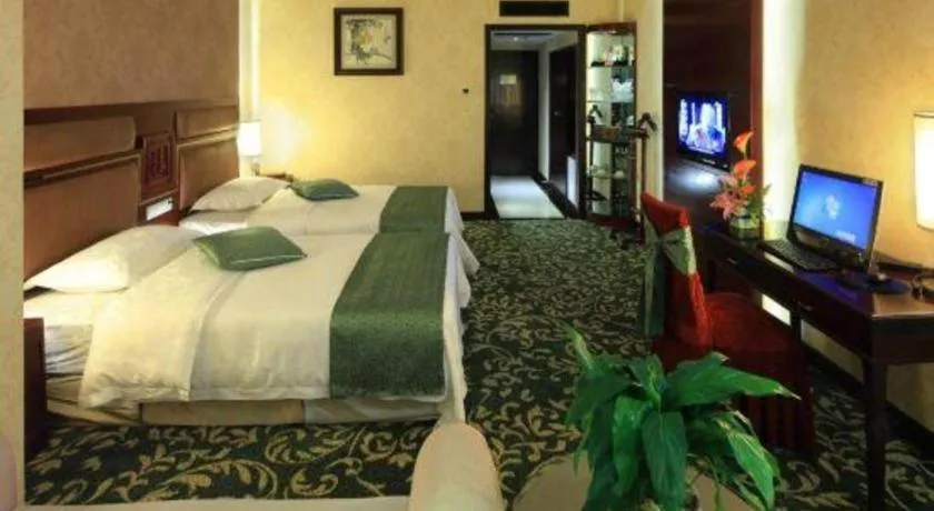 Bed in Economic Trade Hotel