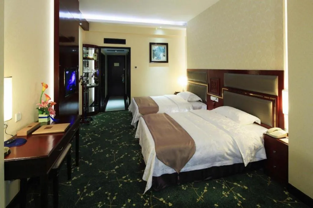 Bed in Economic Trade Hotel